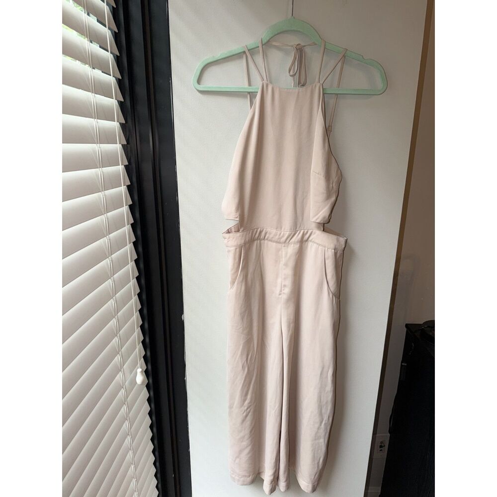 Sleeveless Naked Zebra Small Cream Jumpsuit with Small Cutouts